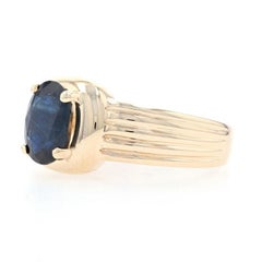 Yellow Gold Sapphire and Diamond Buckle Ring, 14 Karat Oval Cut 2.10 Carat