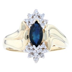 Yellow Gold Sapphire 
Diamond Bypass Ring, 10k Marquise Cut .85ctw