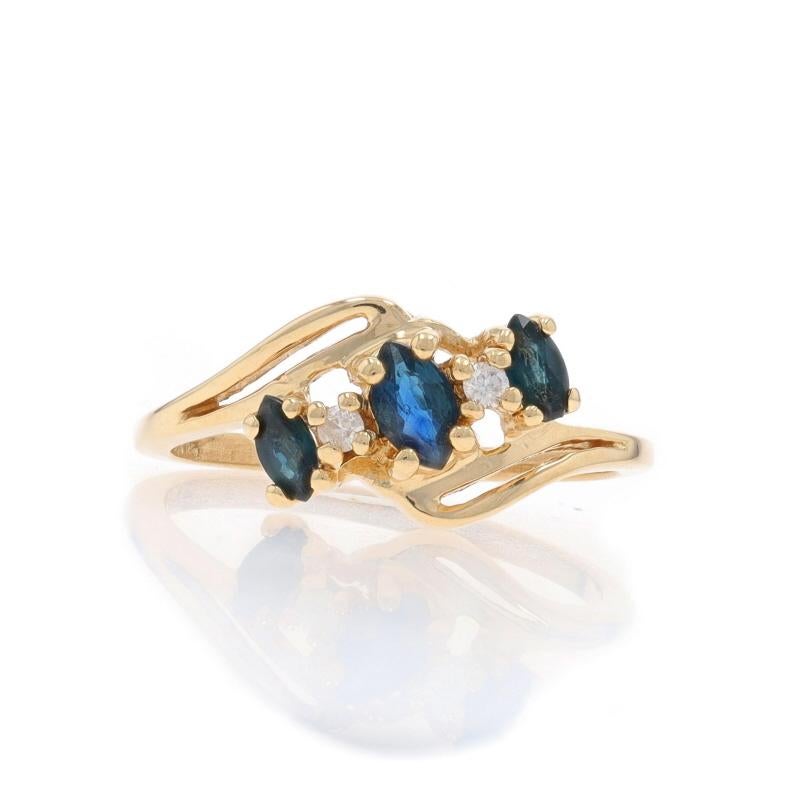 Size: 6
Sizing Fee: Up 3 sizes for $25 or Down 2 sizes for $25

Metal Content: 14k Yellow Gold

Stone Information

Natural Sapphires
Treatment: Heating
Carat(s): .39ctw
Cut: Marquise
Color: Blue & Greenish Blue

Natural Diamonds
Carat(s):