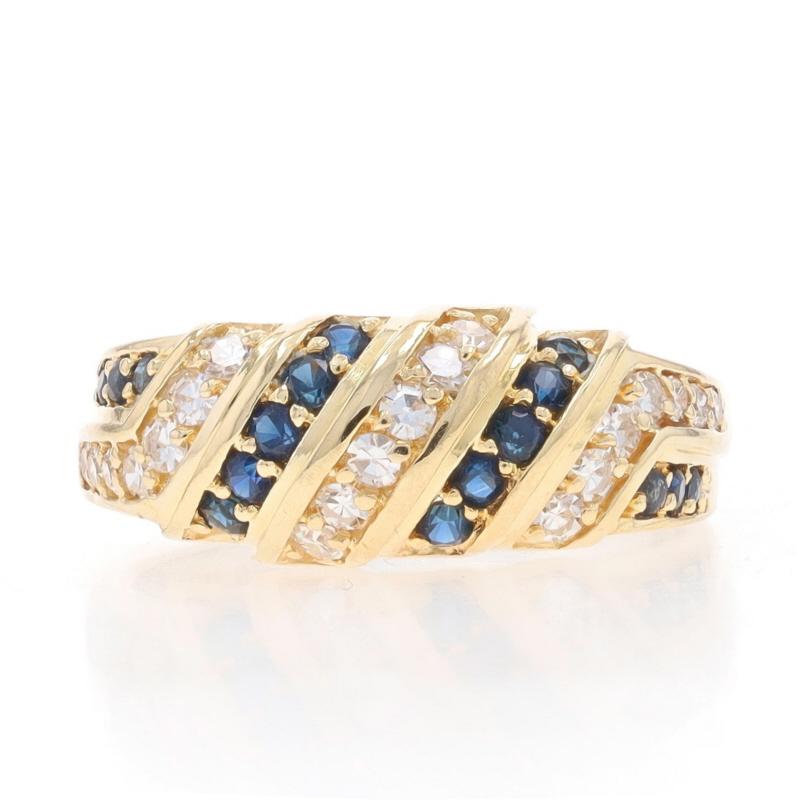 Size: 9
Sizing Fee: Up 2 sizes for $40 or Down 1 size for $30

Metal Content: 14k Yellow Gold

Stone Information

Natural Sapphires
Treatment: Heating
Carat(s): .52ctw
Cut: Round
Color: Blue

Natural Diamonds
Carat(s): .36ctw
Cut: Single
Color: F -