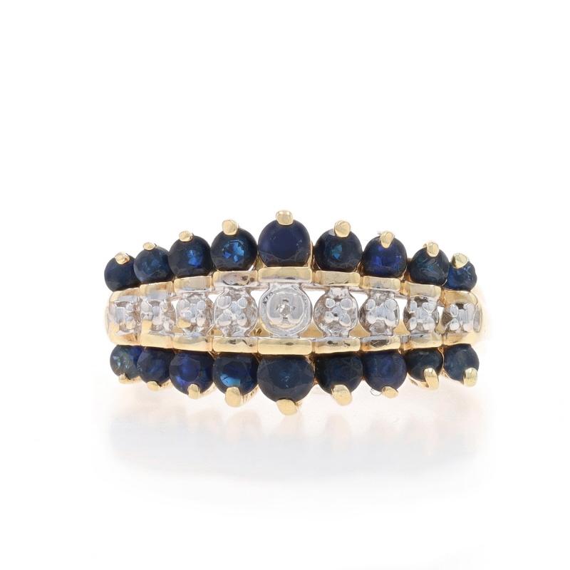 Size: 7
Sizing Fee: Up 2 sizes for $25 or Down 1 size for $25

Metal Content: 10k Yellow Gold & 10k White Gold

Stone Information

Natural Sapphires
Treatment: Heating
Carat(s): 1.33ctw
Cut: Round
Color: Blue

Natural Diamonds
Cut: Single
Stone