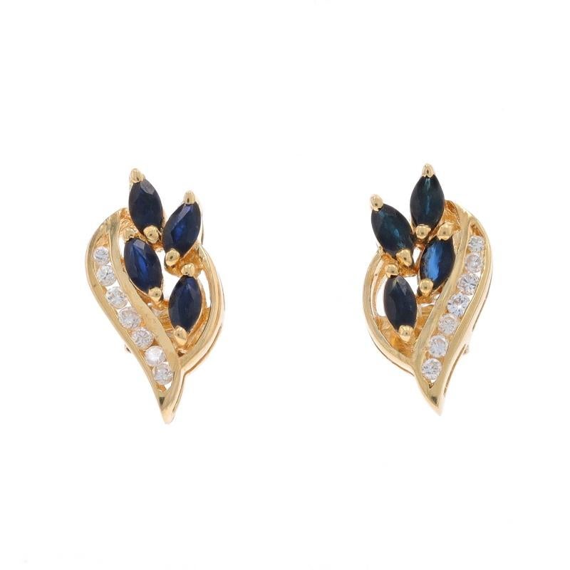Metal Content: 14k Yellow Gold

Stone Information

Natural Sapphires
Treatment: Heating
Carat(s): 1.04ctw
Cut: Marquise
Color: Blue

Natural Diamonds
Carat(s): .20ctw
Cut: Round Brilliant
Color: F - G
Clarity: SI2 - I1

Total Carats: 1.24ctw

Style: