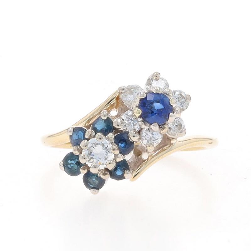 Size: 6
Sizing Fee: Up 3 sizes for $40 or Down 2 sizes for $30

Metal Content: 14k Yellow Gold & 14k White Gold

Stone Information

Natural Sapphires
Treatment: Heating
Carat(s): .78ctw
Cut: Round
Color: Blue

Natural Diamonds
Carat(s): .38ctw
Cut: