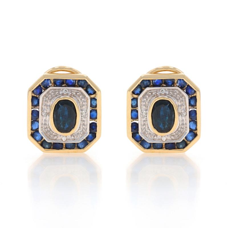 Metal Content: 14k Yellow Gold & 14k White Gold

Stone Information

Natural Sapphires
Treatment: Heating
Carat(s): 1.92ctw
Cut: Oval & Round
Color: Blue

Natural Diamonds
Carat(s): .04ctw
Cut: Single
Color: G - H
Clarity: SI1 - SI2

Total Carats: