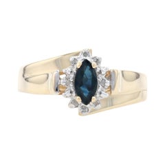 Yellow Gold Sapphire & Diamond Halo Bypass Ring - 10k Marquise Cut .42ctw