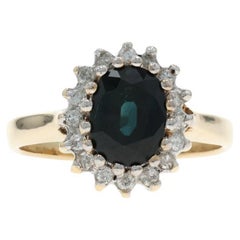 Yellow Gold Sapphire Diamond Halo Ring - 10k Oval 1.75ctw