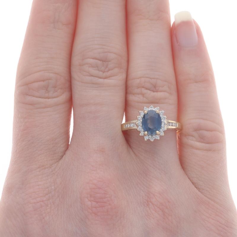 Size: 7 1/4
Sizing Fee: Up 1/2 a size for $25 or Down 1/2 a size for $25

Metal Content: 14k Yellow Gold & 14k White Gold

Stone Information
Natural Sapphire
Treatment: Heating
Carat(s): 1.70ct
Cut: Oval
Color: Blue

Natural Diamonds
Carat(s):