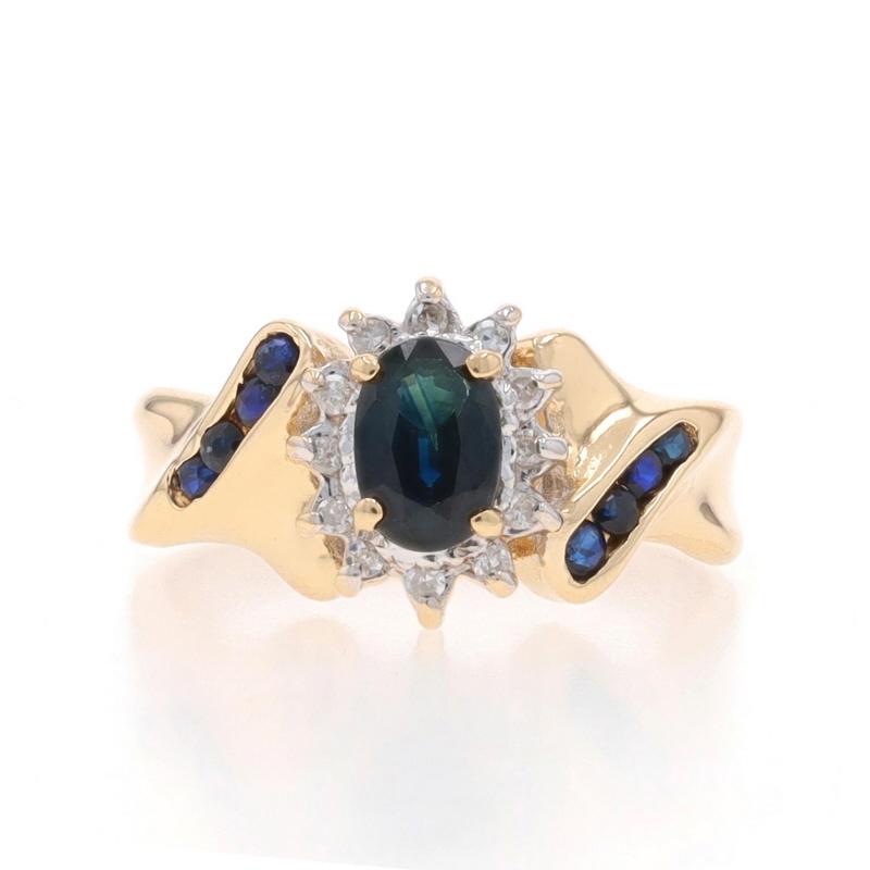 Size: 5
Sizing Fee: Up 1/2 a size for $30 or Down 1/2 a size for $30

Metal Content: 14k Yellow Gold & 14k White Gold

Stone Information

Natural Sapphires
Treatment: Heating
Carat(s): .64ctw
Cut: Oval & Round
Color: Greenish Blue & Blue

Natural