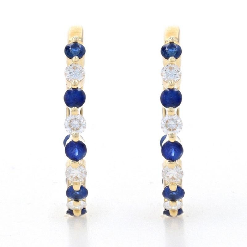 Metal Content: 14k Yellow Gold

Stone Information
Natural Sapphires
Treatment: Heating
Carat(s): .75ctw
Cut: Round
Color: Blue

Natural Diamonds
Carat(s): .50ctw
Cut: Round Brilliant
Color: G
Clarity: VS2 - SI1

Total Carats: 1.25ctw

Style: