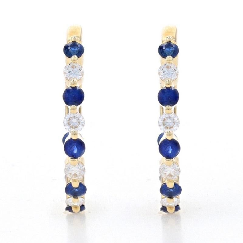 Contenu du métal : Or jaune 14k

Informations sur les pierres
Saphirs naturels
Traitement : Chauffage
Carat(s) : .75ctw
Coupe : Ronde
Couleur : Bleu

Diamants naturels
Carat(s) : .50ctw
Coupe : Brillant rond
Couleur : G
Clarté : VS2 - SI1

Total des