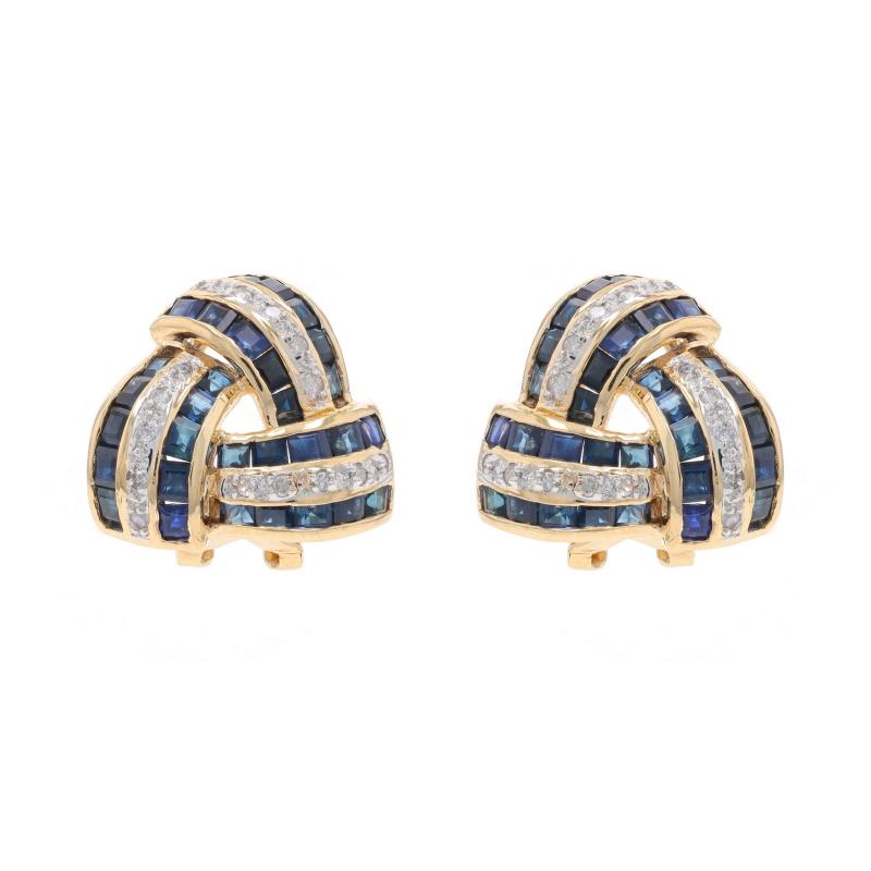 Metal Content: 14k Yellow Gold & 14k White Gold

Stone Information

Natural Sapphires
Treatment: Heating
Carat(s): 3.60ctw
Cut: Square
Color: Blue

Natural Diamonds
Carat(s): .24ctw
Cut: SIngle
Color: G - H
Clarity: I2

Total Carats: 3.84ctw

Style: