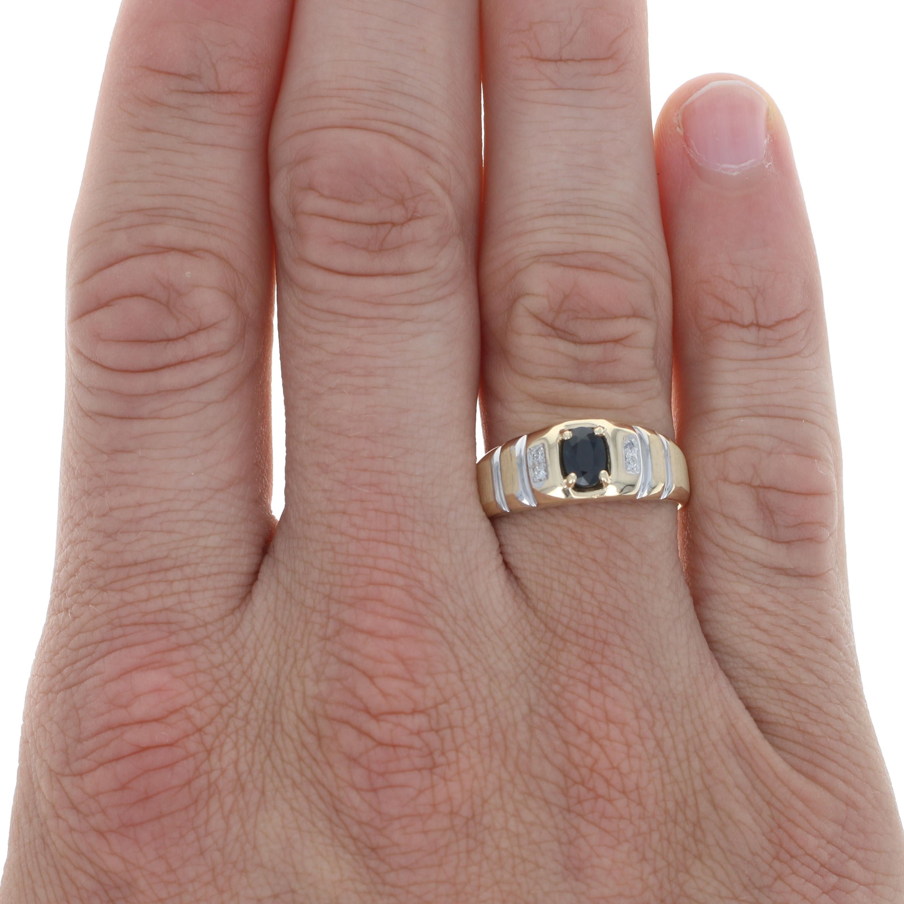 Size: 10
 Sizing Fee: Down 1 size for $30 or Up 2 sizes for $35
 
 Metal Content: 10k Yellow Gold & 10k White Gold
 
 Stone Information: 
 Genuine Sapphire
 Treatment: Heating
 Carat: .65ct
 Cut: Oval
 Color: Blue
 Size: 6.2mm x 4.2mm
 
 Natural