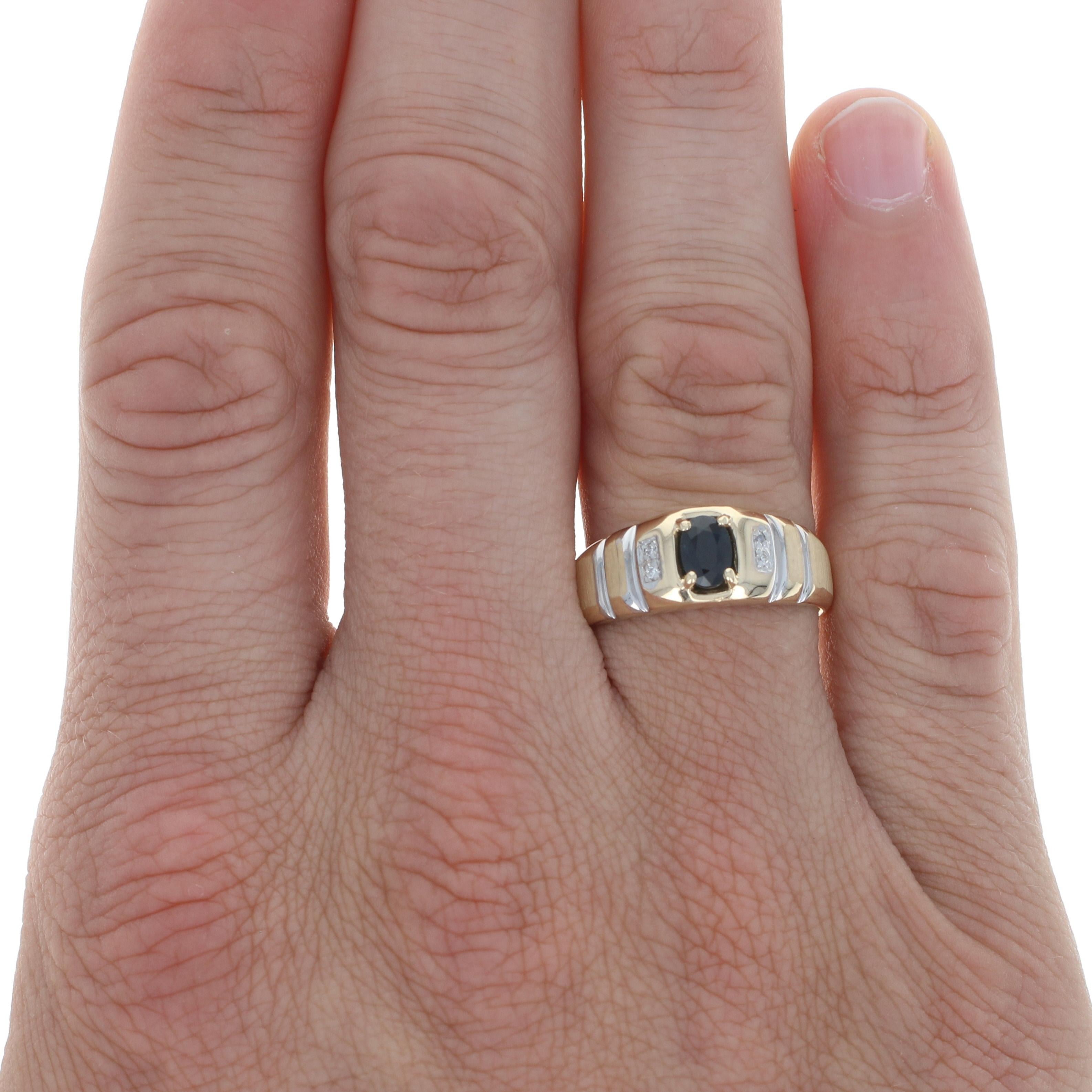 Size: 10
Sizing Fee: Down 1 size for $30 or Up 2 sizes for $35

Metal Content: 10k Yellow Gold & 10k White Gold

Stone Information: 
Genuine Sapphire
Treatment: Heating
Carat: .65ct
Cut: Oval
Color: Blue
Size: 6.2mm x 4.2mm

Natural Diamonds
Carats: