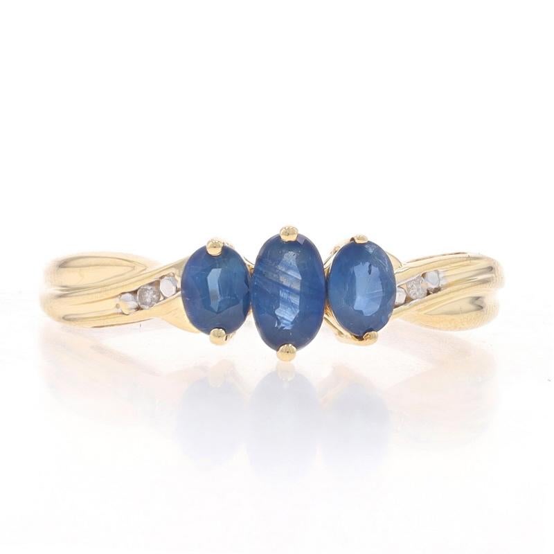 Size: 8 1/4
Sizing Fee: Up 2 sizes for $25 or Down 1 1/2 sizes for $25

Metal Content: 10k Yellow Gold & 10k White Gold

Stone Information

Natural Sapphires
Treatment: Heating
Carat(s): .85ctw
Cut: Oval
Color: Blue

Natural Diamonds
Cut: