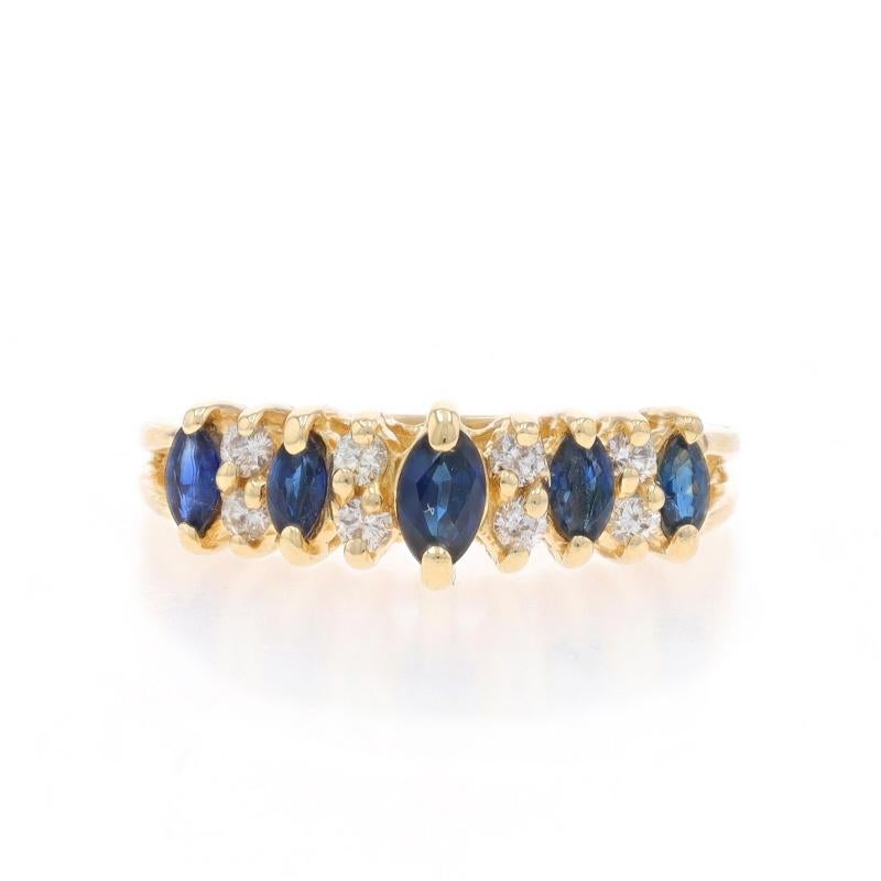 Size: 7
Sizing Fee: Up 2 sizes for $35 or Down 1 size for $35

Metal Content: 14k Yellow Gold

Stone Information

Natural Sapphires
Treatment: Heating
Carat(s): .75ctw
Cut: Marquise
Color: Blue

Natural Diamonds
Carat(s): .20ctw
Cut: Round