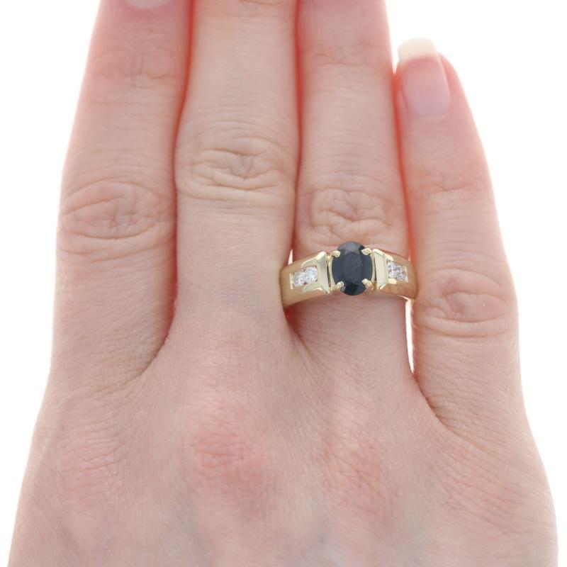 Size: 7 1/2
Sizing Fee: Down 2 for $35 or up 2 for $40

Metal Content: 14k Yellow Gold

Stone Information

Natural Sapphire
Treatment: Heating
Carat(s): 1.20ct
Cut: Oval
Color: Blue

Natural Diamonds
Carat(s): .28ctw
Cut: Round Brilliant 
Color: