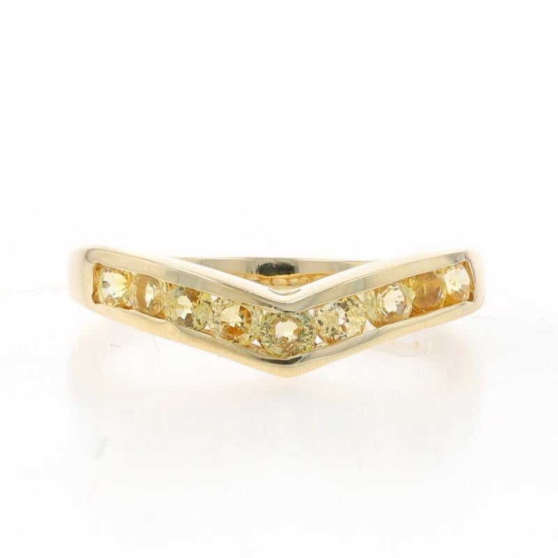 Size: 7
Sizing Fee: Down 1 size for $30

Metal Content: 14k Yellow Gold

Stone Information

Natural Sapphires
Treatment: Heating
Carat(s): .90ctw
Cut: Round
Color: Yellow

Total Carats: .90ctw

Center Contour (east to west): 3.8mm

Style: Enhancer