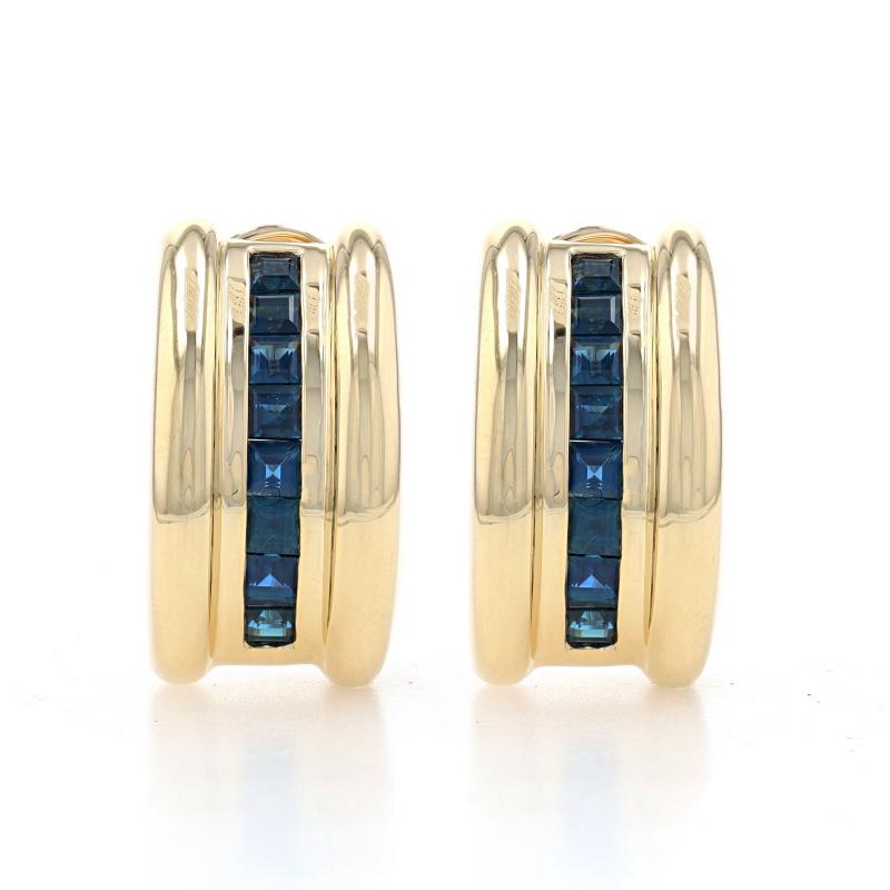 Metal Content: 14k Yellow Gold

Stone Information

Natural Sapphires
Treatment: Heating
Carat(s): 2.24ctw
Cut: Square
Color: Blue

Total Carats: 2.24ctw

Style: J-Hoop
Fastening Type: Omega Closures

Measurements

Tall: 27/32