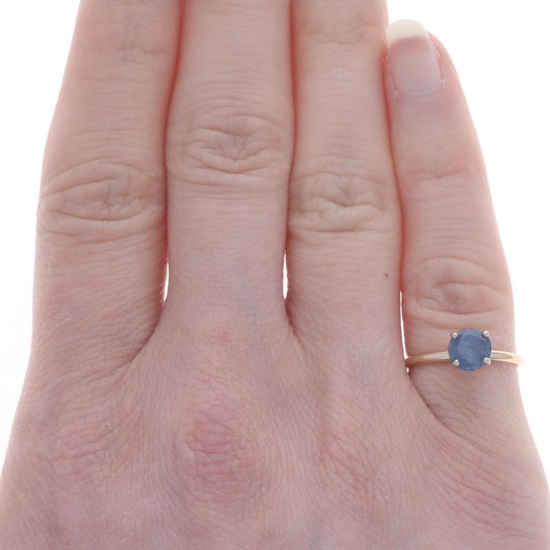Size: 4 1/4
Sizing Fee: Up 5 sizes for $40 or Down 2 sizes for $30

Note: If resized up, the ring's shank will be replaced.

Metal Content: 14k Yellow Gold & 14k White Gold

Stone Information

Natural Sapphire
Treatment: Heating
Carat(s): .65ct
Cut: