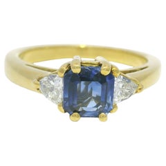 Yellow Gold Sapphire & Trillion Cut Diamond Side Stone 18 Karat Ring In Stock