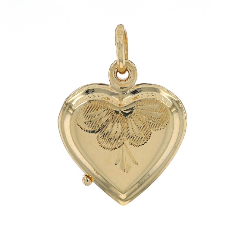 Metal Content: 14k Yellow Gold

Style: Locket
Theme: Scallop Lace Heart, Love
Features: Etched-detailed exterior slides open to reveal two photo frames

Measurements
Tall (from stationary bail): 13/16