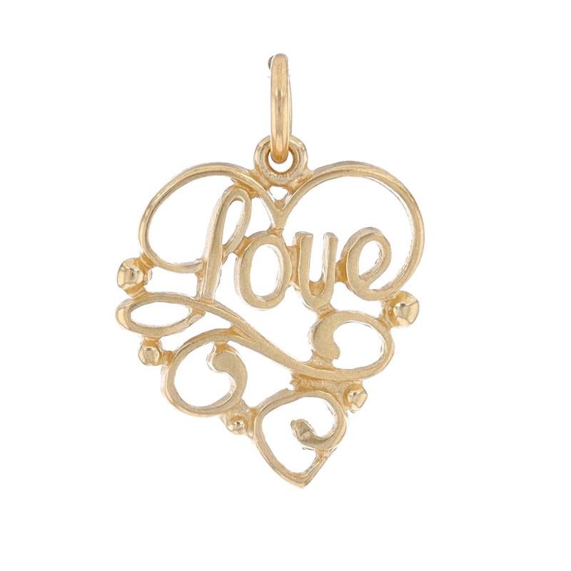 Metal Content: 14k Yellow Gold

Theme: Scrollwork Love Heart, Keepsake
Features: Open Cut Design

Measurements

Tall (from stationary bail): 5/8