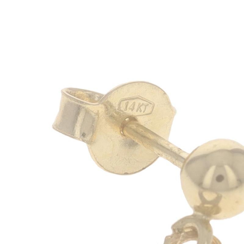 Orecchini a goccia con motivo a volute in oro giallo - 14k - trafitti con texture in vendita 1