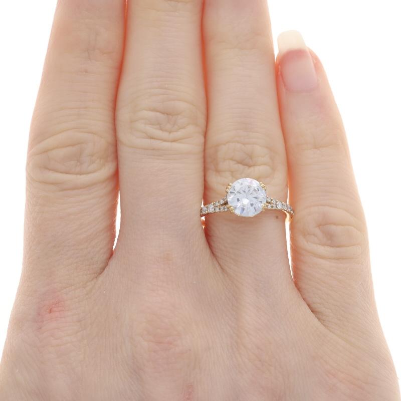 Size: 6 1/2
Sizing Fee: Up 2 1/2 sizes for $35 or Down 1 size for $35

Metal Content: 14k Yellow Gold

Stone Information
Cubic Zirconia (placeholder)
Cut: Round Brilliant

Natural Diamonds
Carat(s): .25ctw (carat stamp)
Cut: Round Brilliant
Color:
