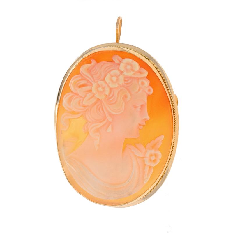 Metal Content: 14k Yellow Gold

Stone Information

Natural Shell
Cut: Carved Cameo
Size: 34mm x 26mm

Style: Convertible Brooch/Pendant
Fastening Type: Hinged Pin and Whale Tail Bullet Clasp
Theme: Silhouette

Measurements

Tall: 1 7/16