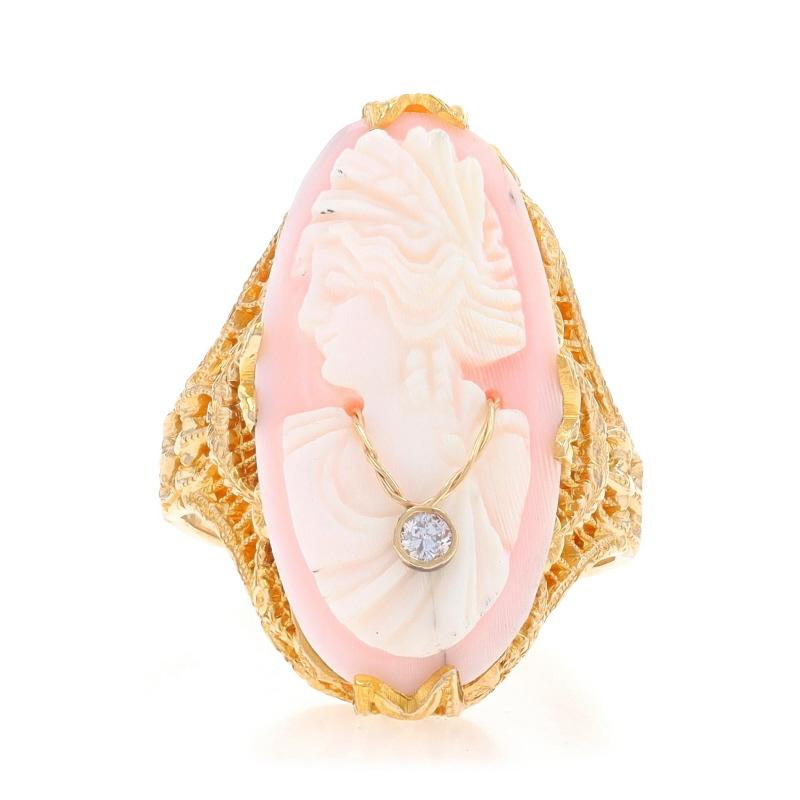 Size: 6
Sizing Fee: Up 2 sizes for $35 or Down 1 size for $35

Era: Art Deco
Date: 1920s - 1930s

Metal Content: 14k Yellow Gold

Stone Information

Natural Shell
Cut: Carved Cameo
Size: (approx.) 23.5mm x 11.5mm

Natural Diamond
Cut: Round