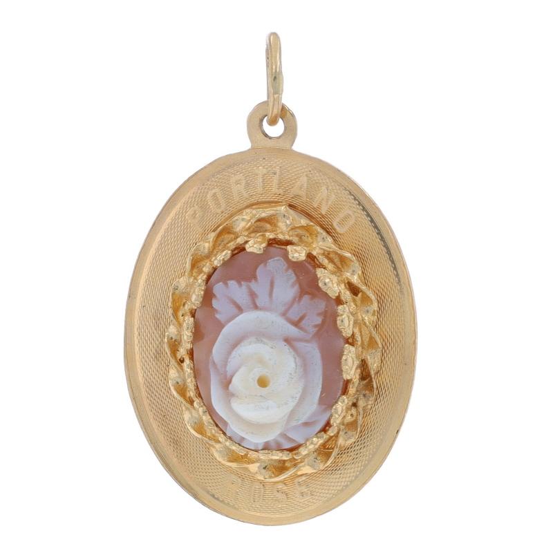 Metal Content: 14k Yellow Gold

Stone Information
Natural Shell
Cut: Carved Cameo
Size: (approx.) 12.9mm x 9.7mm

Style: Cameo
Theme: Portland Rose

Measurements
Tall (from stationary bail): 1 3/32