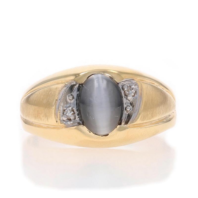 Size: 9
Sizing Fee: Up 3 sizes for $30 or Down 2 sizes for $30

Metal Content: 10k Yellow Gold & 10k White Gold

Stone Information

Simulated Cat's Eye
Cut: Oval Cabochon

Natural Diamond
Cut: Single

Style: Solitaire with Accents
Features: Brushed