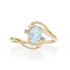 Yellow Gold Sky Blue Topaz Diamond Bypass Ring - 10k Oval .51ctw