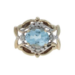 Colgante de oro amarillo con diamantes y topacio azul cielo - 10k Oval 1.10ct