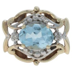 Colgante de oro amarillo con diamantes y topacio azul cielo - 10k Oval 1.10ct