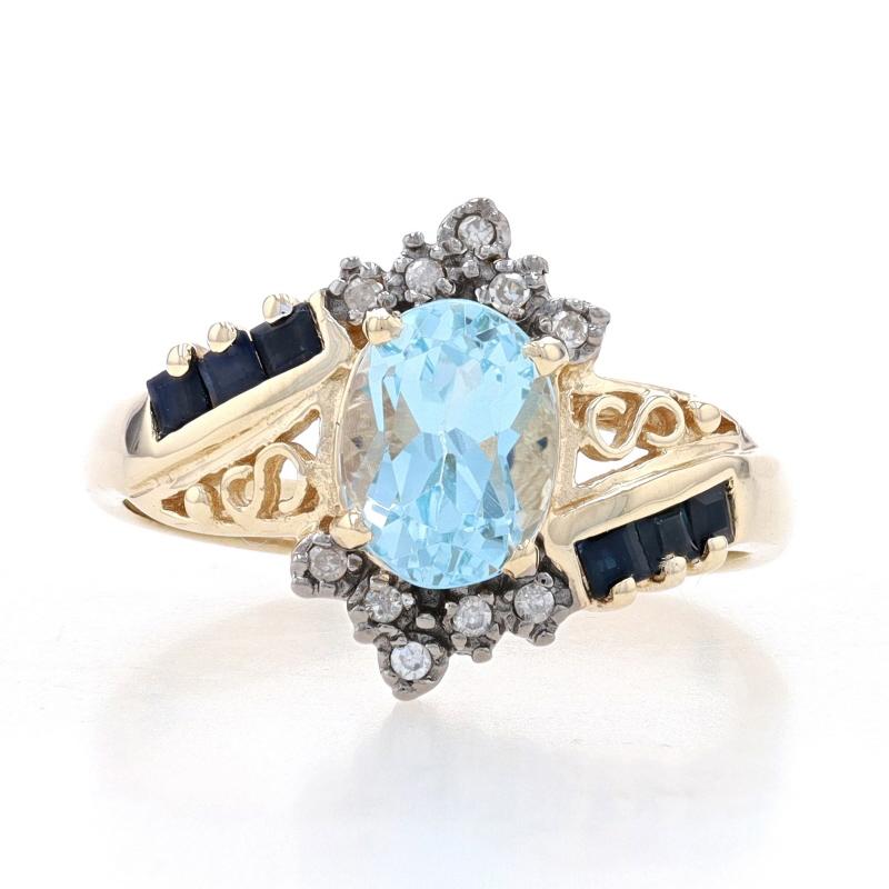 Size: 8
Sizing Fee: Up 2 sizes for $35 or Down 3 sizes for $30

Metal Content: 10k Yellow Gold & 10k White Gold

Stone Information

Natural Sky Blue Topaz
Treatment: Routinely Enhanced
Carat(s): 1.60ct
Cut: Oval

Natural Sapphires
Treatment: