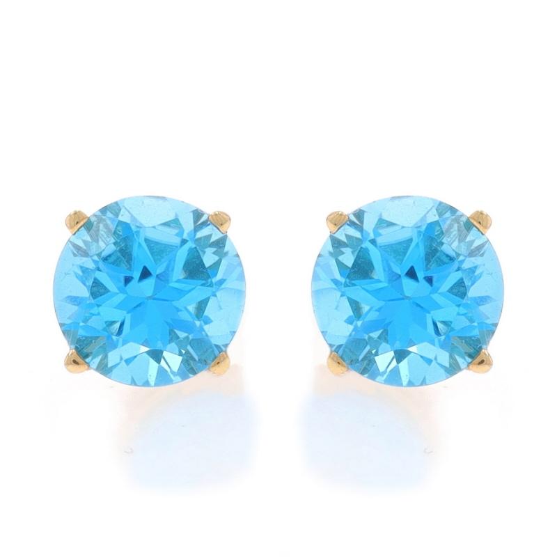 Metal Content: 14k Yellow Gold

Stone Information

Natural Sky Blue Topaz
Treatment: Routinely Enhanced
Carat(s): 3.10ctw
Cut: Round

Total Carats: 3.10ctw

Style: Stud
Fastening Type: Butterfly Closures

Measurements

Tall: 5/16