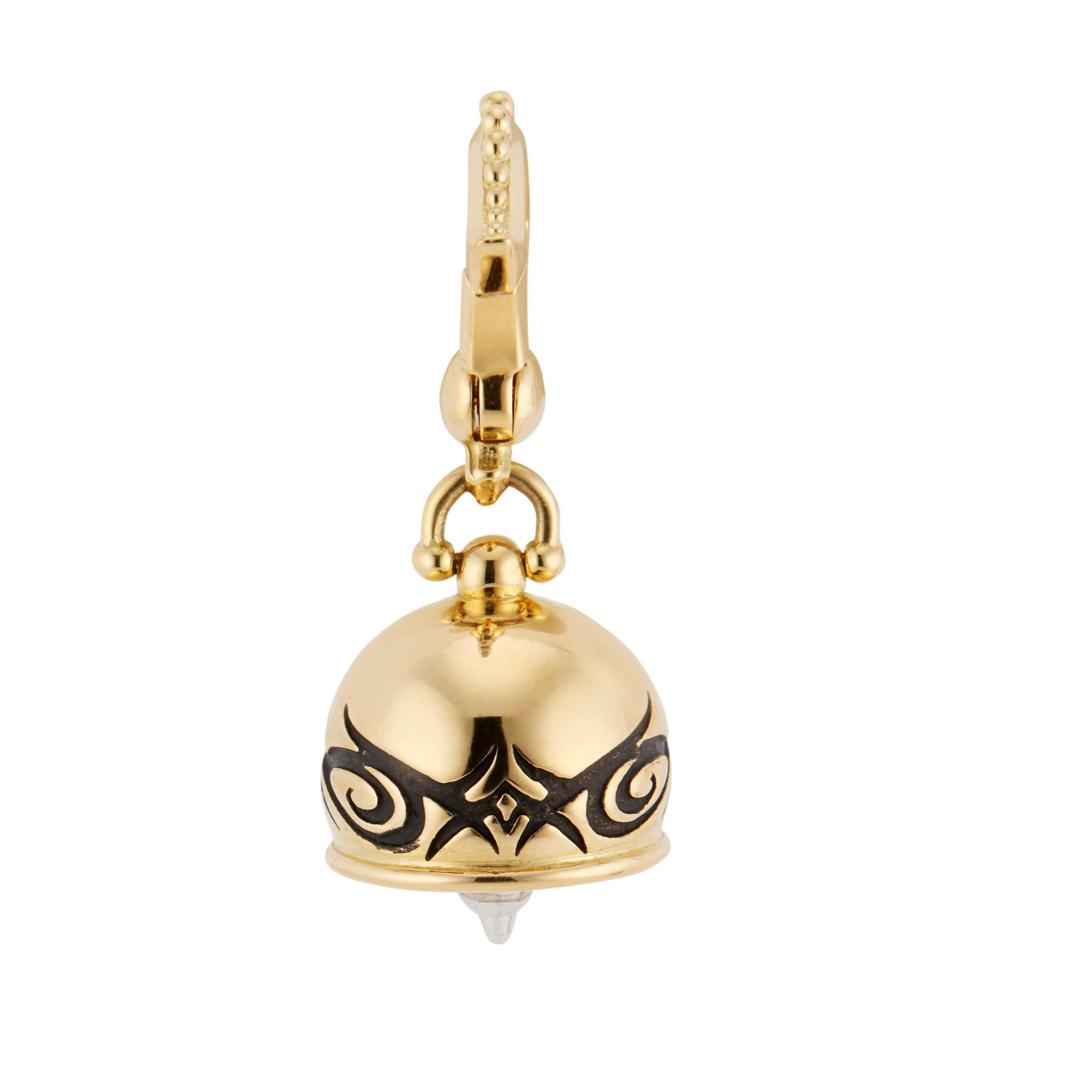 Small size meditation bell in 18k yellow gold with black rhodium pattern by Paul Morelli.

18k yellow gold 
Stamped: 750
Hallmark: Morelli 
5.1 grams
Top to bottom: 25.8mm or 1 Inch
Width: 11.7mm or .5 Inch
Depth or thickness: 11.5mm
