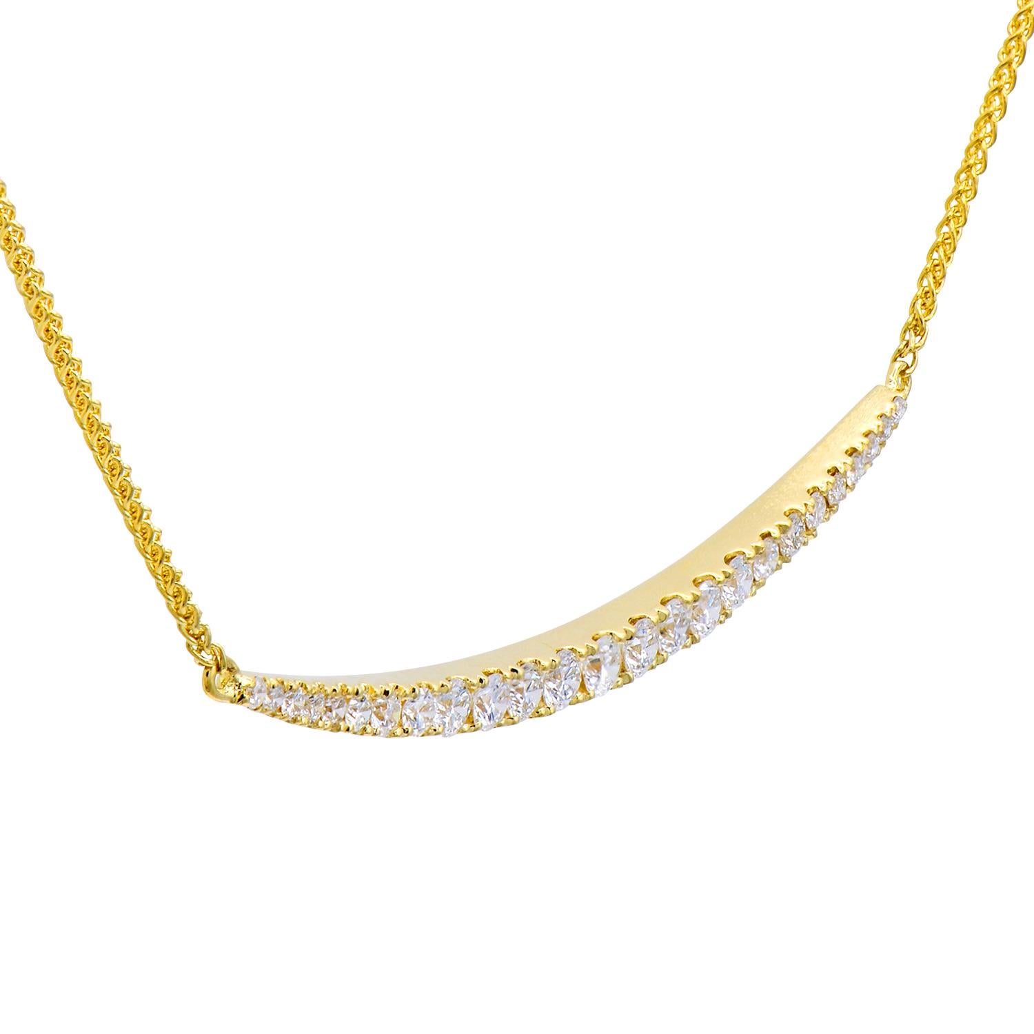 Add a smile to your face with this curved diamond row necklace that reminds you of a smile. The necklace is covered in 25 round VS2, G color diamonds totaling 0.47 carats and is attached to an 18-inch chain. The diamonds are set in 2.8 grams of 18