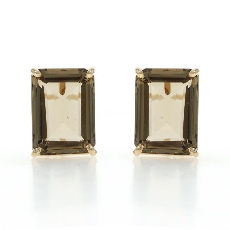 Metal Content: 14k Yellow Gold

Stone Information

Natural Smoky Quartz
Carat(s): 14.50ctw
Cut: Emerald

Total Carats: 14.50ctw

Style: Stud
Fastening Type: Butterfly Closures

Measurements

Tall: 7/16