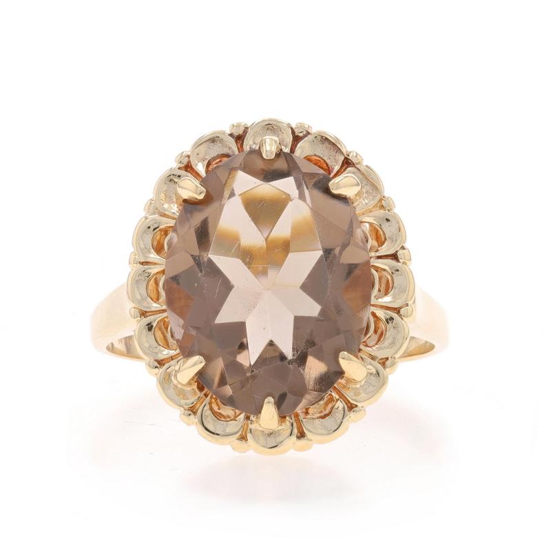 Size: 10 1/2
Sizing Fee: Up 3 sizes for $30 or Down 3 sizes for $30

Era: Vintage

Metal Content: 10k Yellow Gold

Stone Information

Natural Smoky Quartz
Carat(s): 6.95ct
Cut: Oval
Color: Brown

Total Carats: 6.95ct

Style: Cocktail