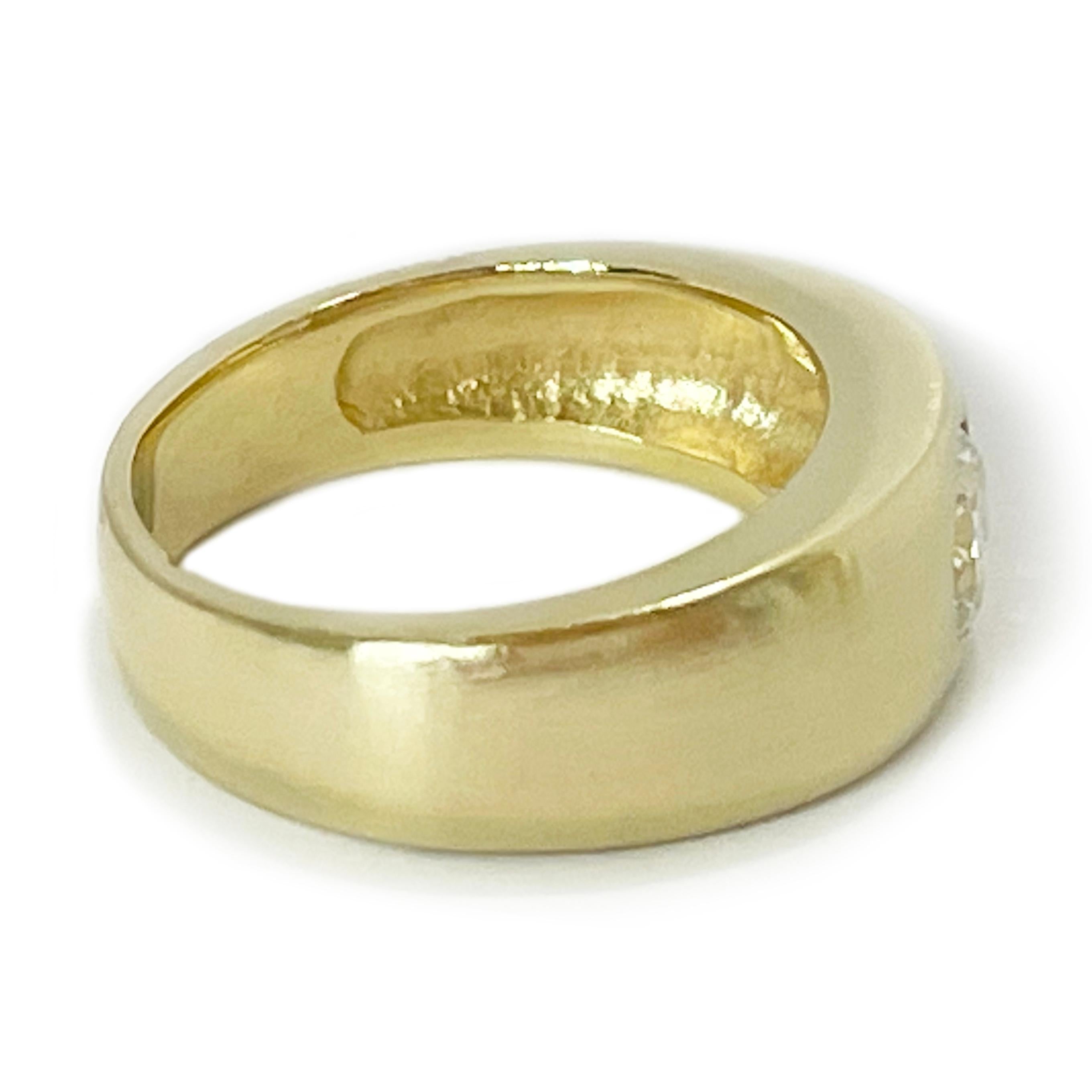 wide gold band with solitaire diamond