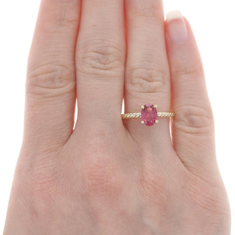 Size: 7
Sizing Fee: Up 2 sizes for $35 or Down 3 sizes for $30

Metal Content: 14k Yellow Gold

Stone Information

Natural Spinel
Carat(s): 1.09ct
Cut: Oval
Color: Reddish Pink

Total Carats: 1.09ct

Style: Solitaire
Features: Rope twist band