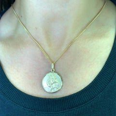 Yellow gold St. Christopher coin pendant necklace