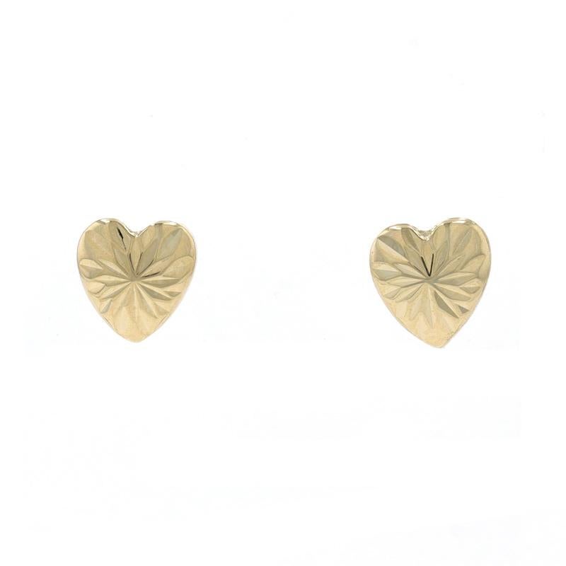 Metal Content: 14k Yellow Gold

Style: Stud
Fastening Type: Butterfly Closures
Theme: Love, Starburst Hearts
Features: Smoothly finished with etched detailing

Measurements

Tall: 9/32