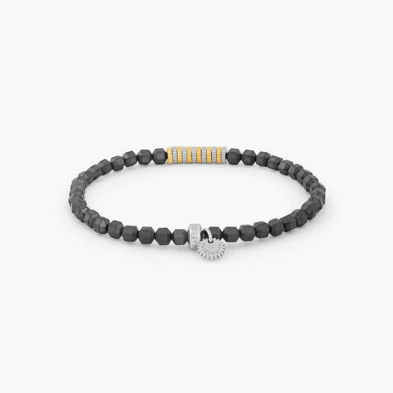 Pulsera de engranajes de hematites en forma de icosaedro de oro amarillo y plata de ley, talla S

Con cuentas de hematites gris de 20 caras, también conocidas como icosaedros, hemos combinado estas piedras únicas con nuestro característico disco de