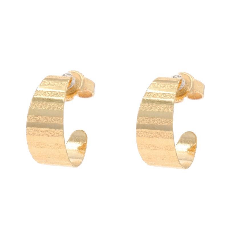 Metal Content: 14k Yellow Gold

Style: Tapered Half-Hoop
Fastening Type: Butterfly Closures
Theme: Stripe
Features: Smoothly Finished with Textured Detailing

Measurements
Tall: 9/16