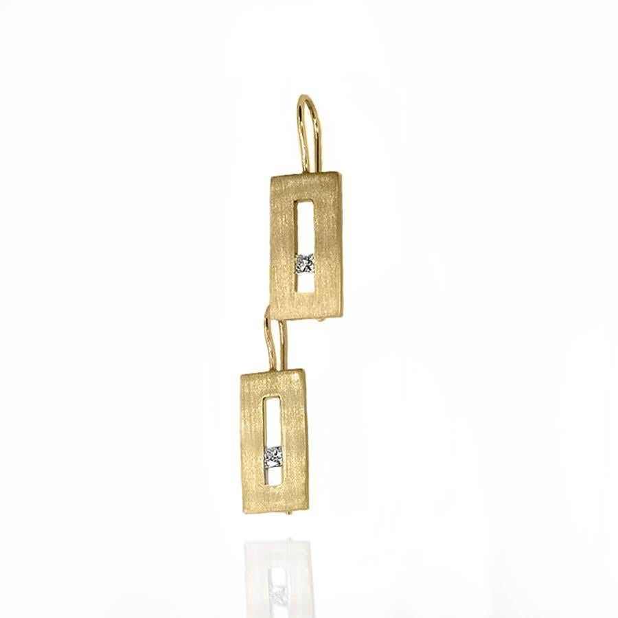 These Diamond in Yellow Gold Suspended Rectangle hook earrings from our Suspension Collection echo the idea of princess cut diamonds set off center. Shown in yellow gold with approximately .20 pts diamond total weight in a matte finish. Available in