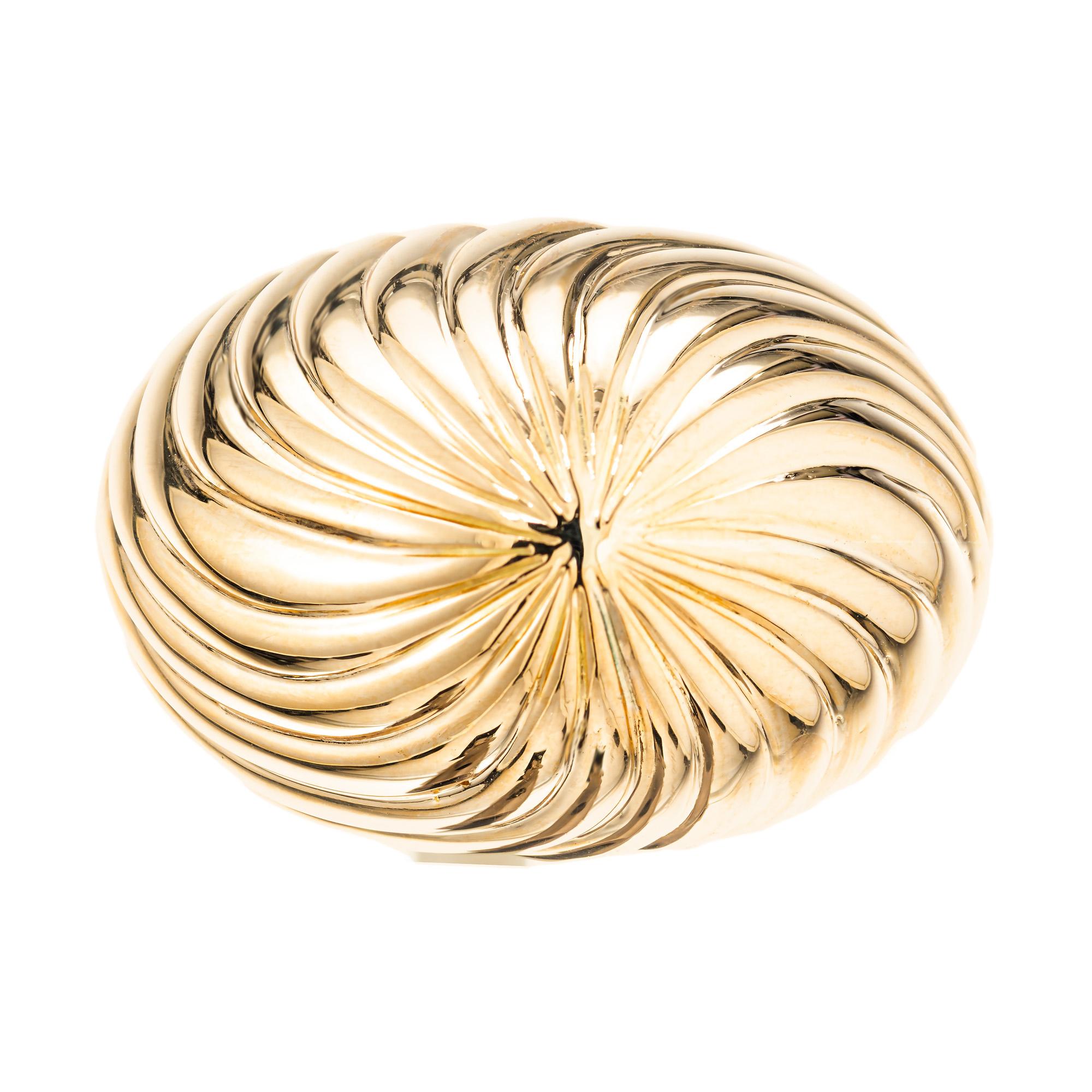Swirl motif high dome cocktail ring, in 14k yellow gold. Perfect example of the 1960's vintage cocktail ring. Circa 1960-1970.  

Size 6.25 and sizable 
14k yellow gold 
Tested: 14k
15.6 grams
Width at top: 16.7mm
Height at top: 9.7mm
Width at
