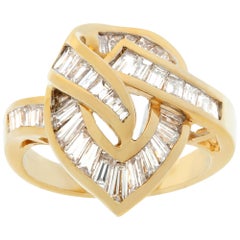 Yellow gold swirl of diamonds ring w/ around 3 carats in baguette diamonds